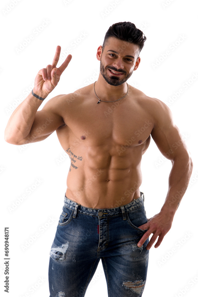 Fototapeta premium A shirtless man posing for the camera doing V for Victory sign with fingers