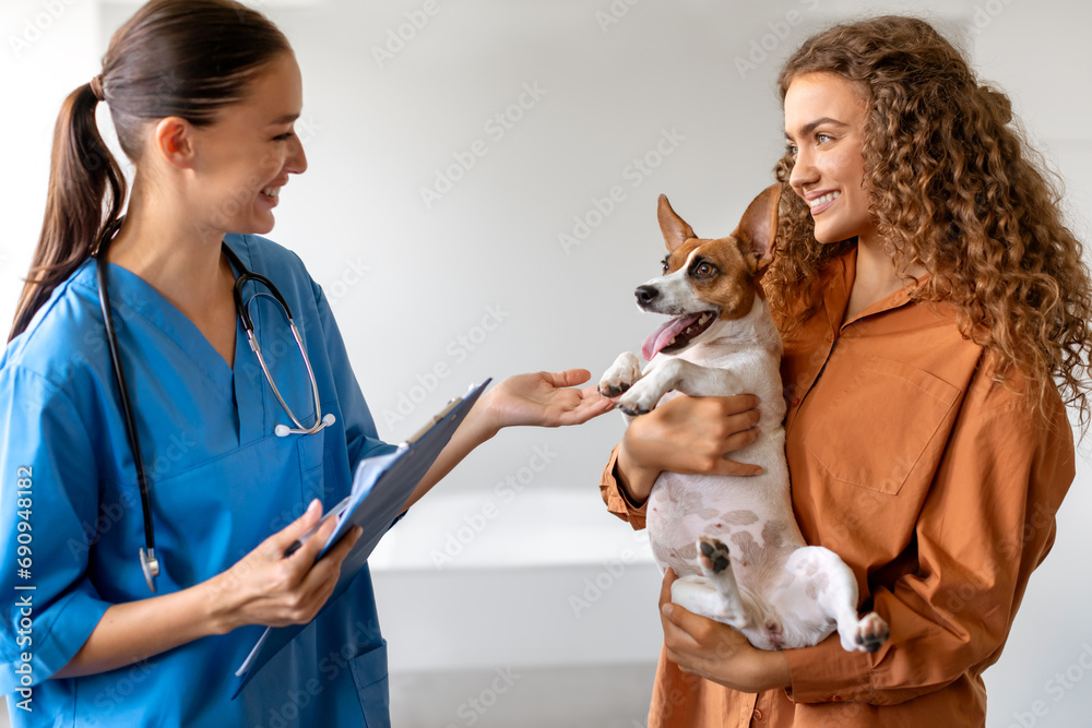 Vet clinic visit with dog and women Vet clinic visit with dog and women