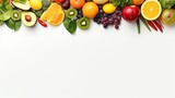 Fresh fruits and vegetables on a white background with copy space. Healthy food concept.