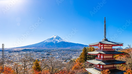 Panorama view of Chureito Red Pagoda is a five-story pagoda with a beautiful backdrop of Mount Fuji, a popular and famous place considered a symbol of Japan. photo