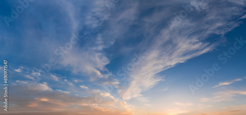 Panorama of the sky with cirrus clouds at sunset photo
