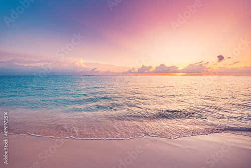 Fototapeta Naklejka Na Ścianę i Meble -  Inspirational ocean beach sunset. Colorful sunny sky clouds. Calm peaceful sea waves soft sand meditation positive energy coast. Paradise tropical beach summer tranquil seascape. Relax best vacation