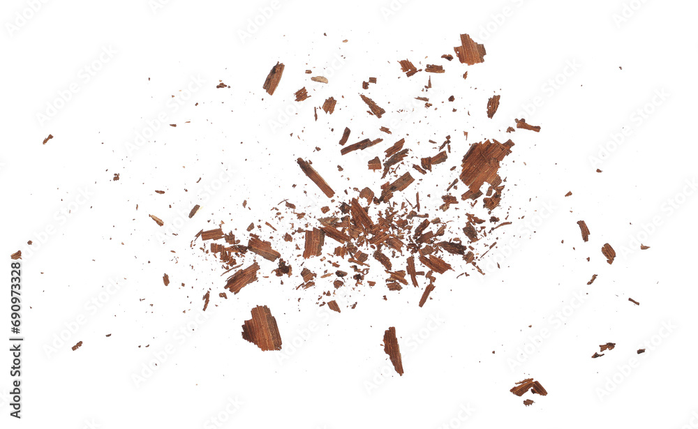 Wood pieces and dust, crushed tree bark isolated on white background, organic texture, top view
