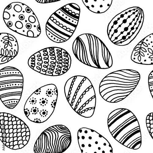Hand drawn seamless pattern with many black lined easter eggs with different dots, waves, lines.Easter party ornament background on white.