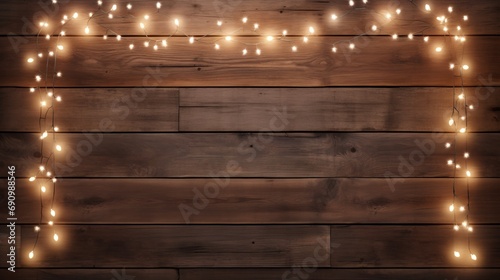 Christmas background. lights on a wooden wall for the christmas holiday,large copy space for text, advertisement, commercial and marketing, banner or wallpaper 