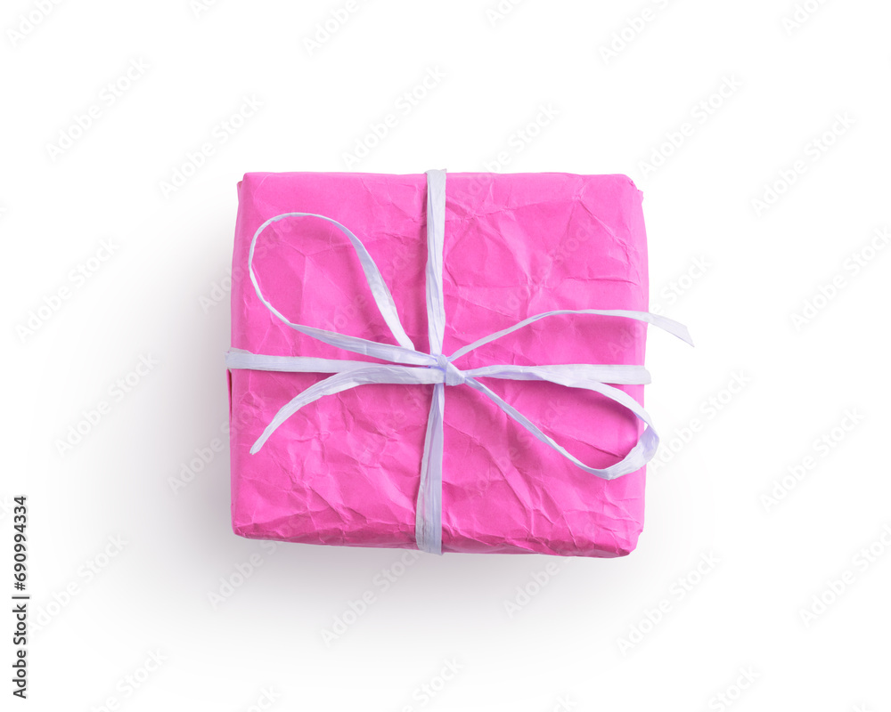 Top view of crumpled paper pink color present box with recycled paper ribbon isolated on white Top view of crumpled paper pink color present box with recycled paper ribbon isolated on white