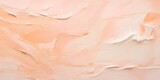 The texture of oil paint from a brush on canvas, the color peach fuzz, textured background.