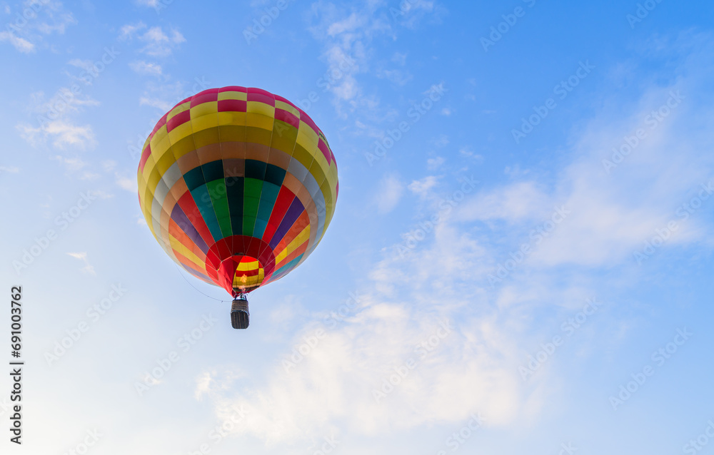Big colorful balloon on blue sky background Big colorful balloon on blue sky background