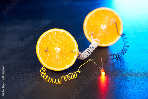 Free energy electricity generator using oranges. photo