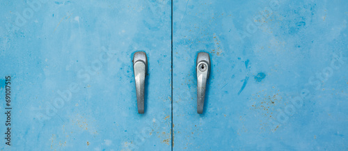 blue metal locker along  in a typical High School.