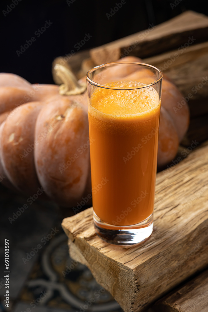 Pumpkin fresh on a wooden table Pumpkin fresh on a wooden table