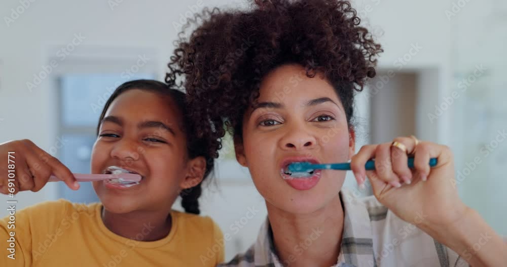 Mother, daughter and brushing teeth for dental hygiene, oral health and wellness, bathroom and support. Happy family, toothbrush and smile or laughing, clean and fresh breath or mouth, care and joy