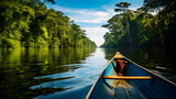 A tranquil canoe journey on the Amazon River surrounded by dense rainforest.