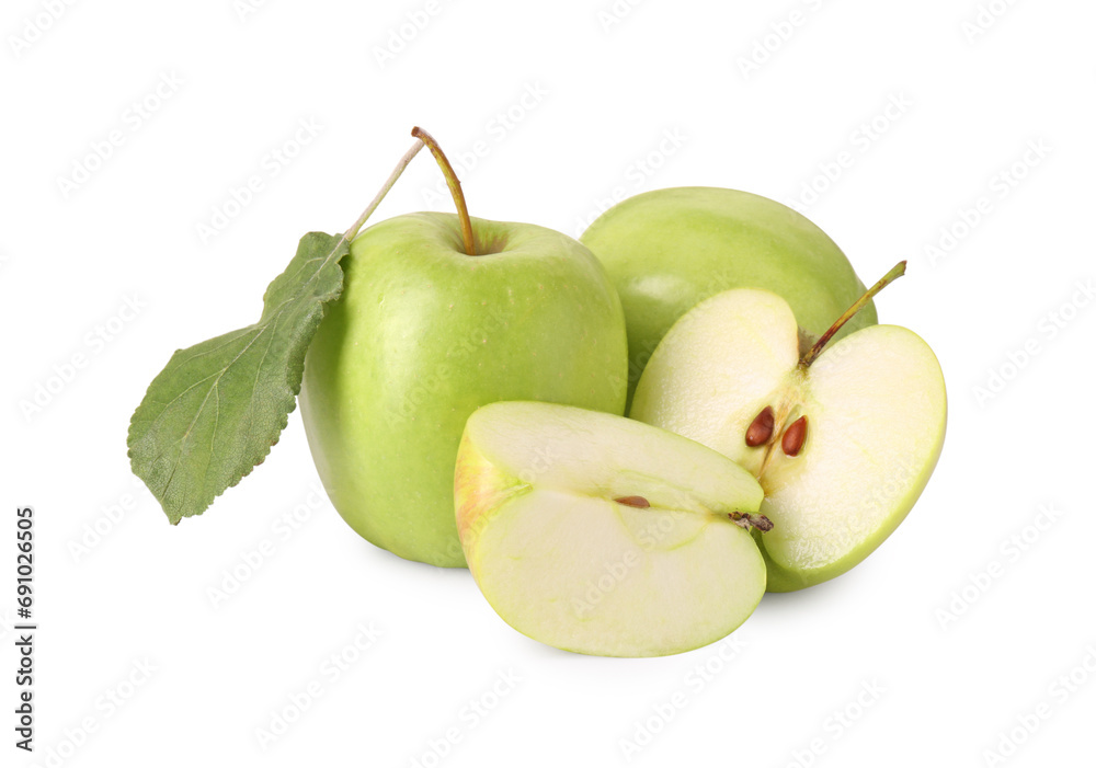 Whole and cut green apples isolated on white Whole and cut green apples isolated on white