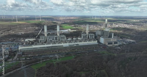 Large sclae industrial power plant. Fossil fuels turn into energy and electricty. Aerial drone view. photo