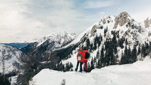 Happy couple enjoys a relaxing day outdoors in a stunning snowy landscape