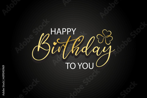 Happy birthday handwritten golden text lettering on black background.