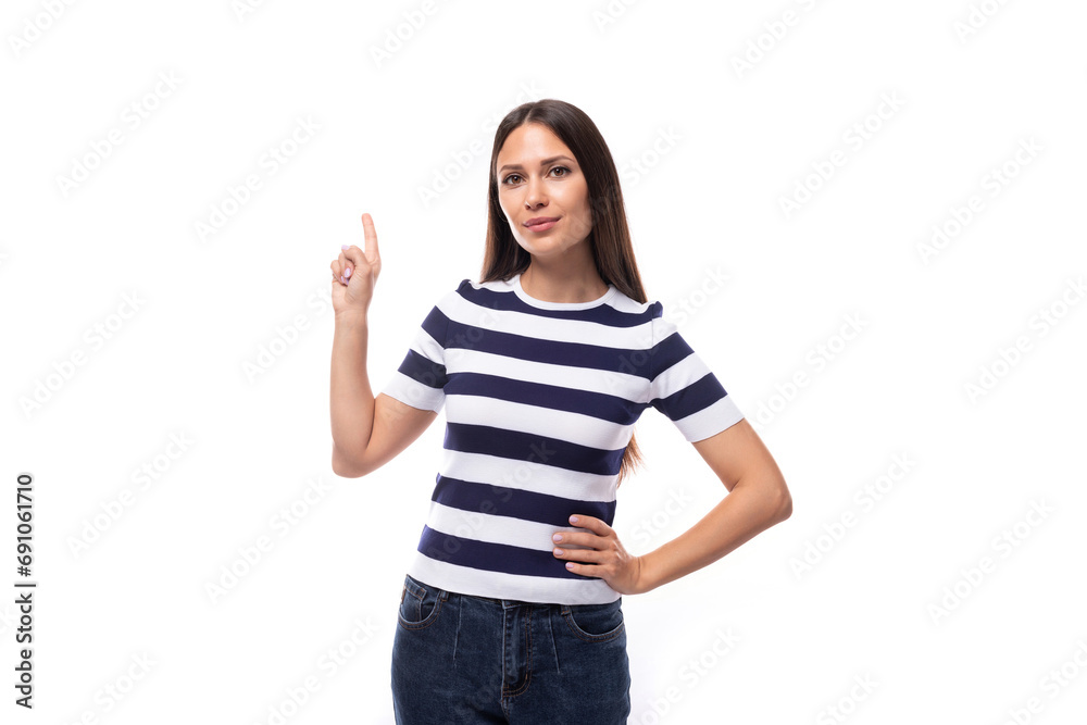 joyful young european promoter woman with black straight hair in a striped black and white t-shirt and jeans joyful young european promoter woman with black straight hair in a striped black and white t-shirt and jeans