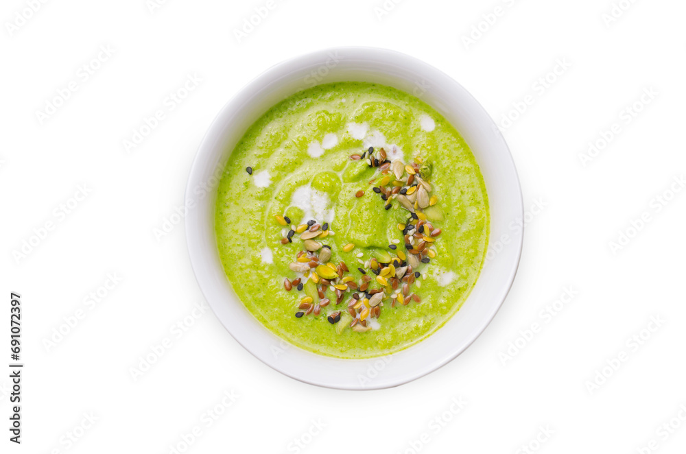Green Vegan Broccoli Cream Soup with Cashew Milk and Seed Mix, Detox Healthy Eating on White Background Green Vegan Broccoli Cream Soup with Cashew Milk and Seed Mix, Detox Healthy Eating on White Background