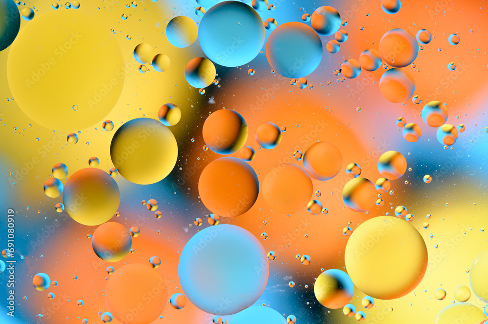 blue and orange spots with multi-colored circles similar to the galaxy and microcosm 4
