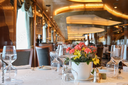 Art Deco interior design style furniture, carpets and paneling onboard classic ocean liner cruiseship cruise ship main dining room restaurant photo
