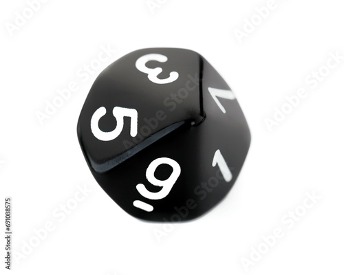 D10 black 10 sided dice isolated on white. RPG dice. Decahedron DND dice photo