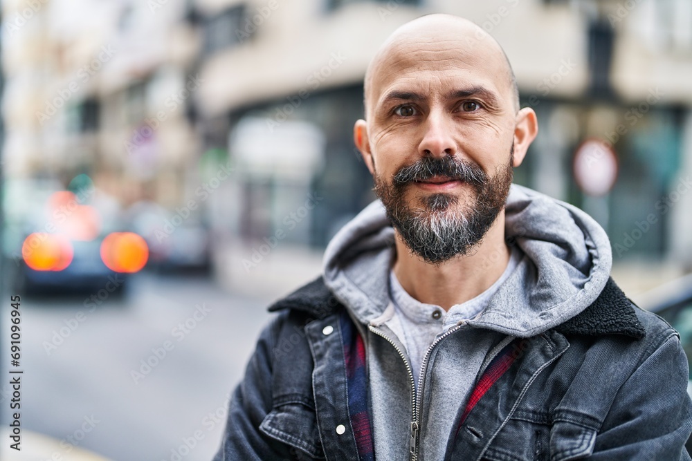 Young bald man smiling confident standing at street Young bald man smiling confident standing at street