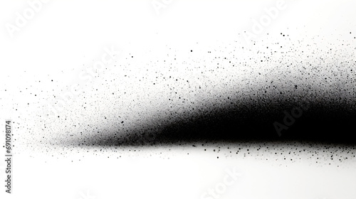 Charcoal flecks, dotty grain structure, abstract dotted sand sensation, graded from spots against white backdrop. photo