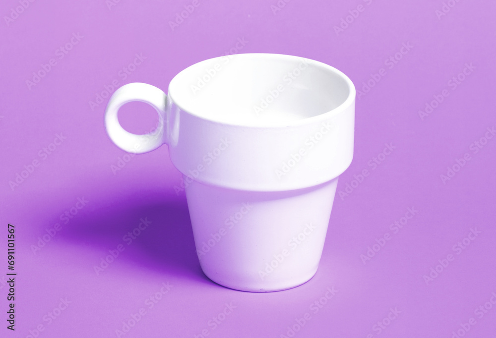 White coffee cup isolated on a solid background