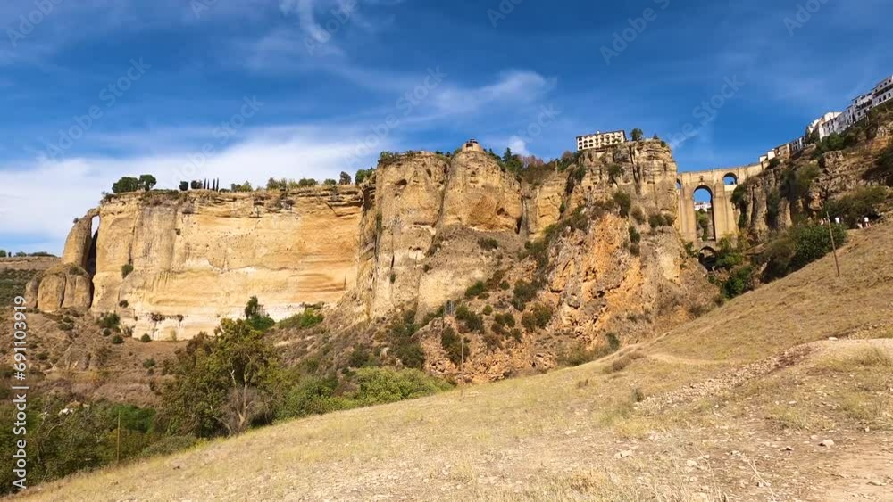 Panoramic view of Puente Nuevo Bridge on sunny day in Ronda, Spain Panoramic view of Puente Nuevo Bridge on sunny day in Ronda, Spain