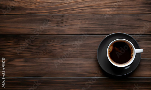 the background of a cup of coffee seen from above on a wooden base