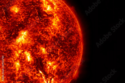 Fototapeta Naklejka Na Ścianę i Meble -  The sun on a dark background in space. Elements of this image furnished by NASA
