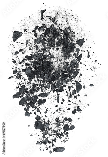Charcoal dust with fragments on a white background, top view. Black dust powder. photo