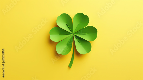 green paper clover on a yellow background, shamrock, symbol, st. patrick's day, luck, nature, plant, national irish holiday, spring, march 17, flower, tradition, religious