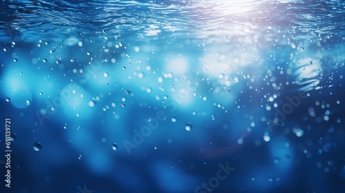 Water drops or oil bubbles on blue background. Droplets panorama picture