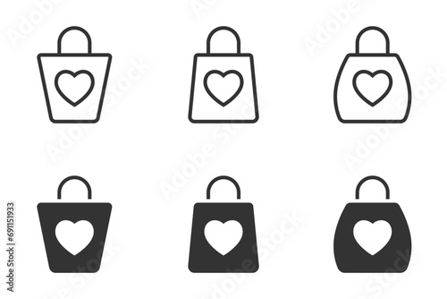 Set of shopping bag icon with heart symbol. Vector illustration