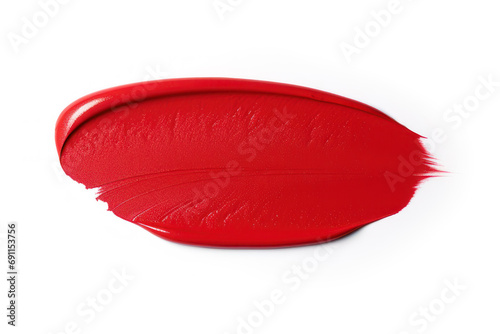 Red lipstick smear isolated on white background. Red color cosmetic product brush stroke swipe sample. Beauty makeup product texture. Top view