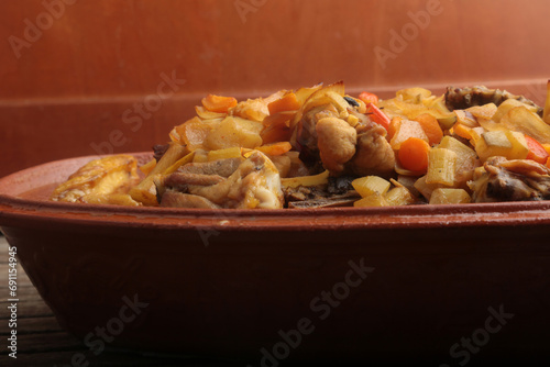 chicken with vegetables in a roman pot photo