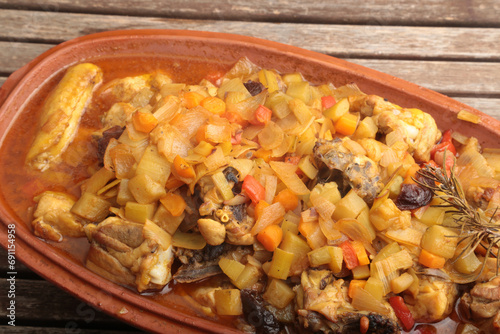 chicken with vegetables in a roman pot photo