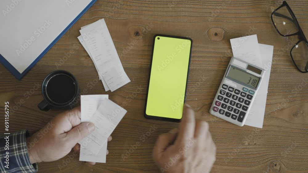 man making payment by smartphone mobil application