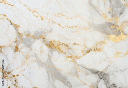 a close up image of marble with gold leaf detail