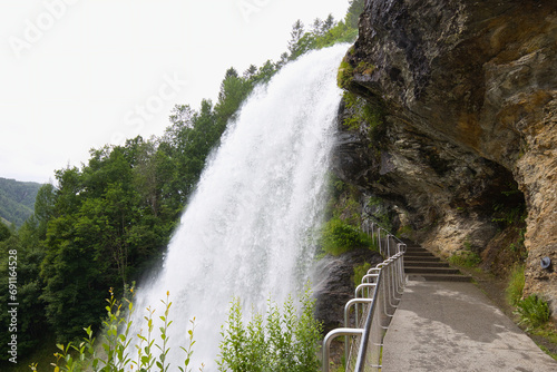 There is an accessible footpath behind the Steindalsfossen waterfall near Norheimsund in Norway.    photo