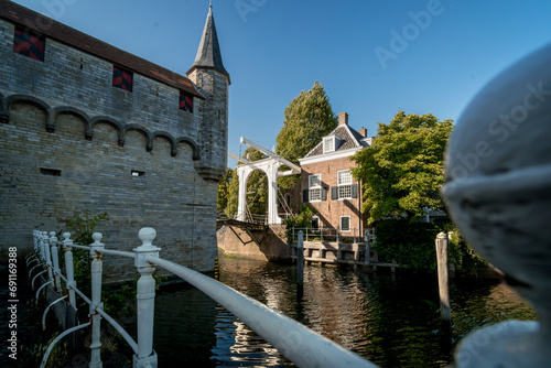 Dutch Draw Bridge and medieval fortifications of a water gate with passage to inner harbor in old village Zierikzee