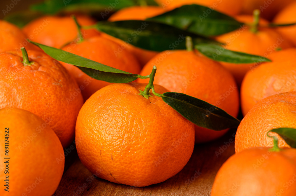 fresh juicy tangerines on a wooden table 2 fresh juicy tangerines on a wooden table 2