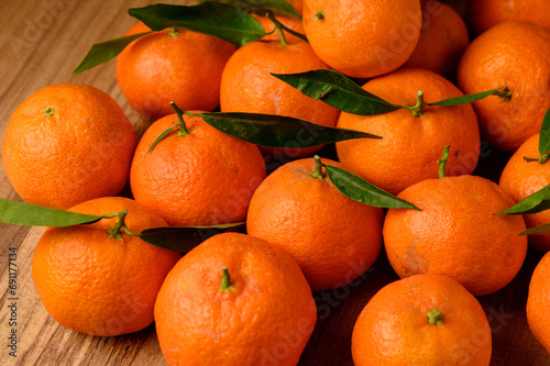 fresh juicy tangerines on a wooden table 13