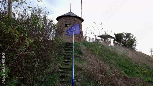 The old windmill in Tiszasziget in South Hungary photo