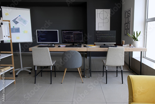 Modern office workspace wit...
