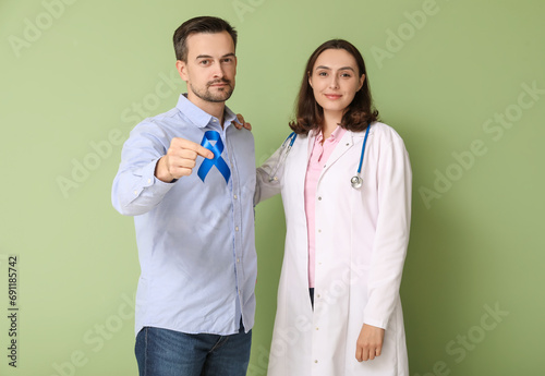 Adult man and female doctor...