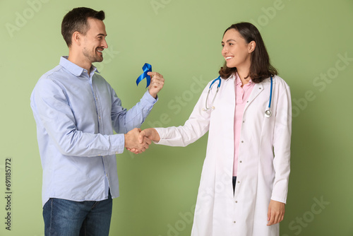 Adult man and female doctor...