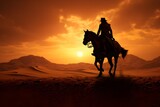 silhouette of a man cowboy riding a horse in the middle of the desert